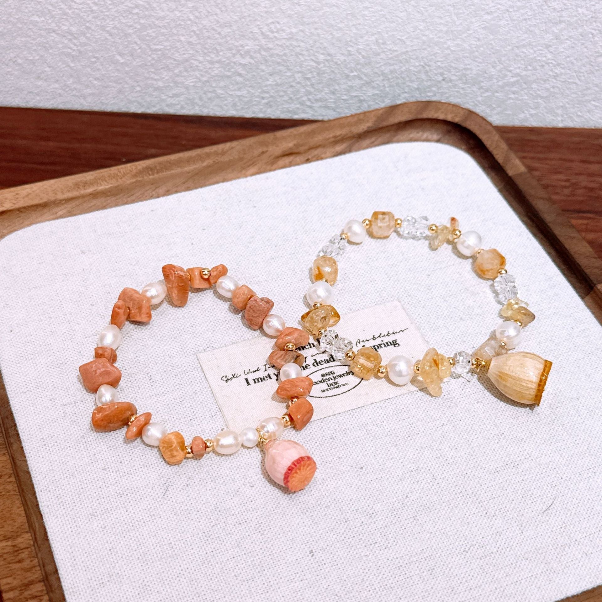 Handmade dried flower lucky charm bracelet with natural yellow crystal sunstone and freshwater pearl – a gentle and elegant accessory