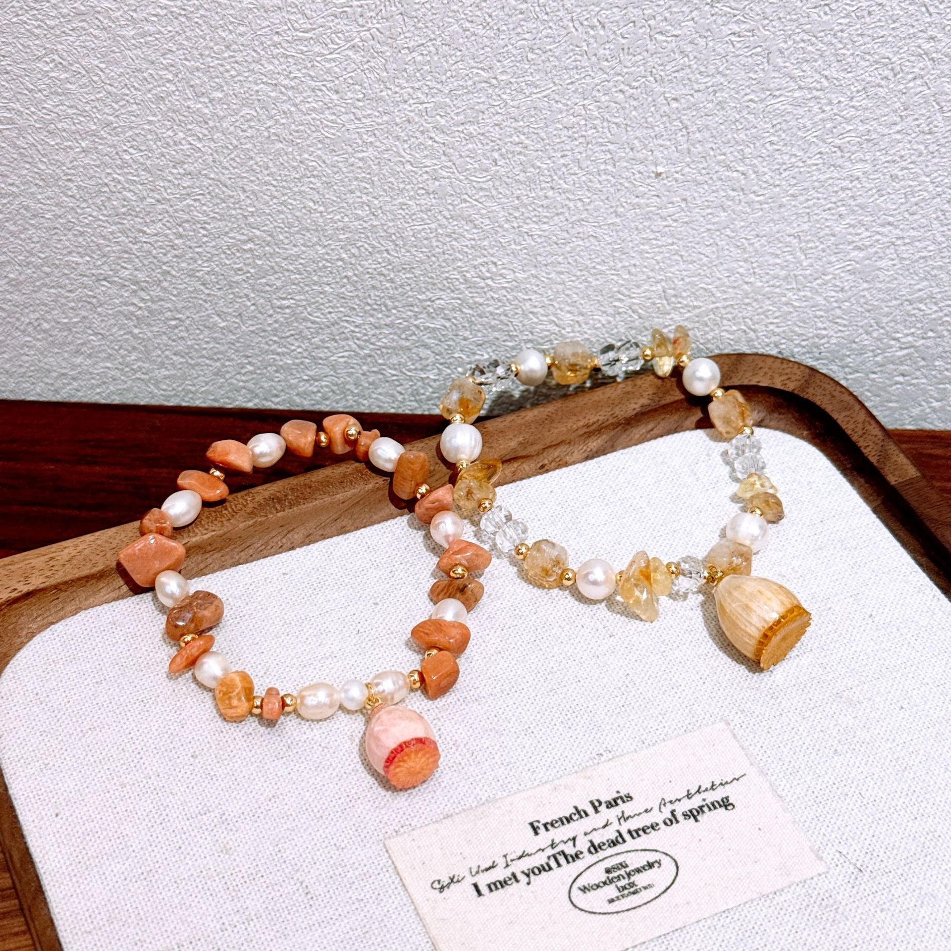 Handmade dried flower lucky charm bracelet with natural yellow crystal sunstone and freshwater pearl – a gentle and elegant accessory