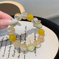 Natural crystal bracelet lemon quartz white crystal yellow resin freeform golden rutilated quartz running ring light luxury bracelet