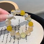 Natural crystal bracelet lemon quartz white crystal yellow resin freeform golden rutilated quartz running ring light luxury bracelet